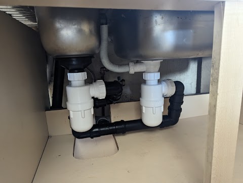 S. P. MITCHELL, plumber in Liverpool